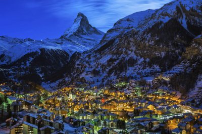 Luxury chalets in Zermatt seen from the Northern end of the town with the Matterhorn Peak at Dawn, Switzerland