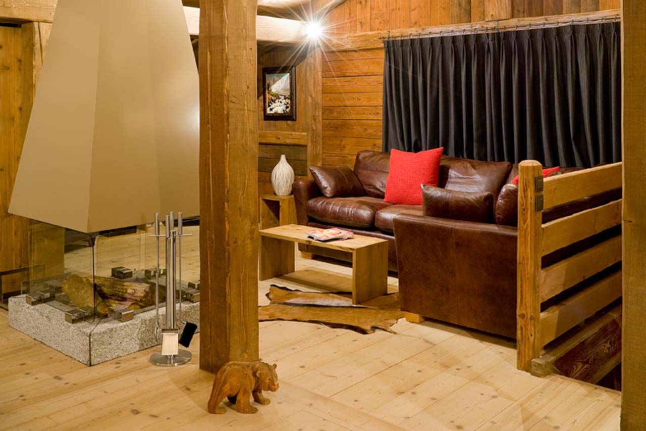 Living room with fireplace at Chalet Baby Bear in Chamonix