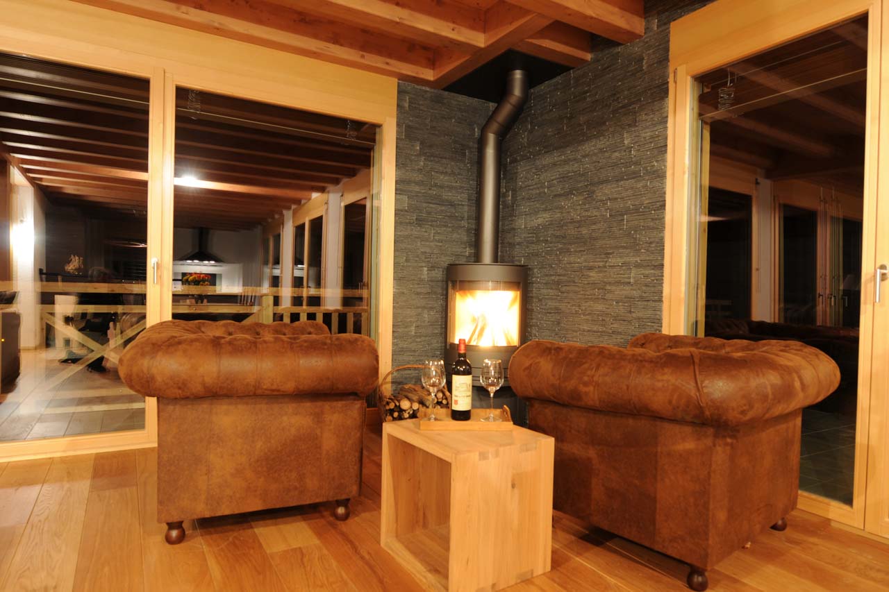 Chalet Le Torrent in Crans Montana living area with armchairs