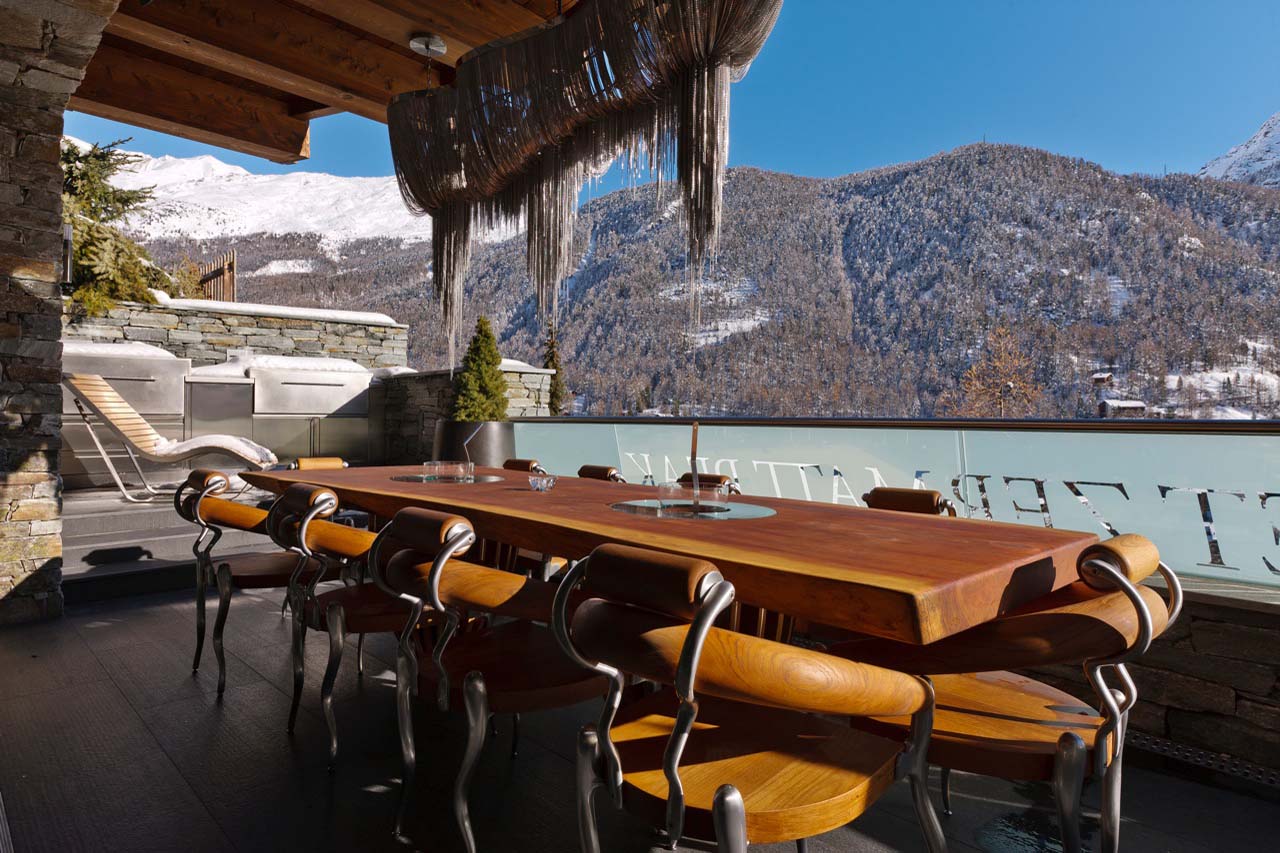 Al fresco dining on the terrace at Chalet Zermatt Peak in Zermatt