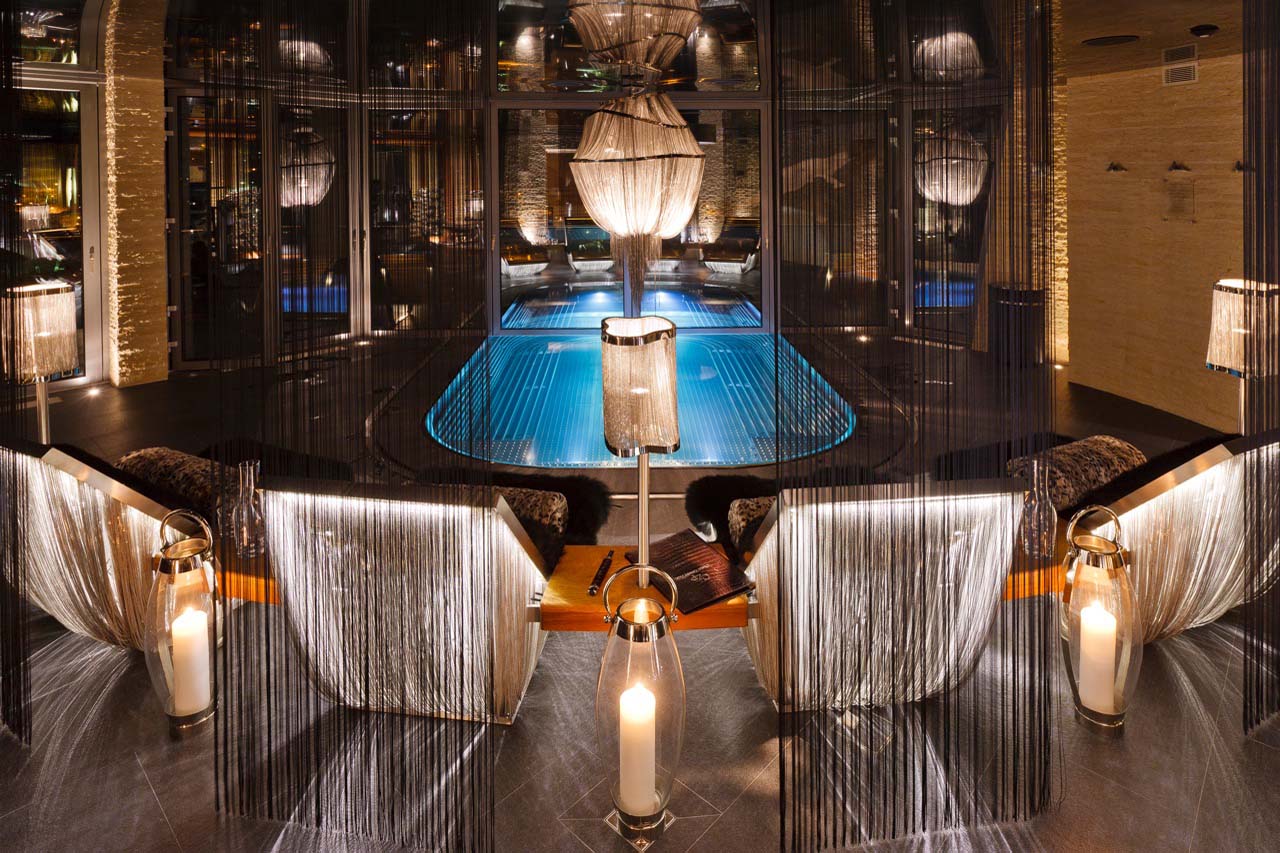 Jacuzzi and loungers in spa area at Chalet Zermatt Peak in Zermatt